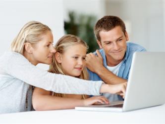 Family at computer with student