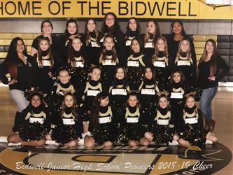 cheer team in uniform in gym