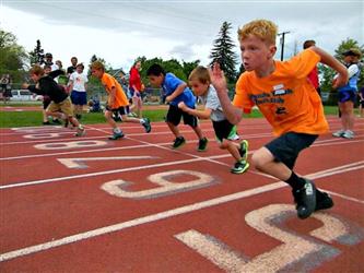 Middle school students on track, running