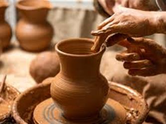 ceramic vase on wheel being made