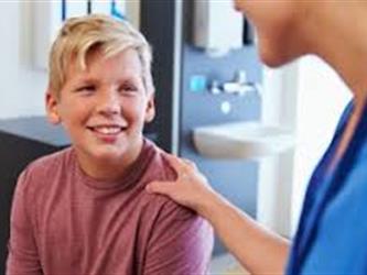boy with doctor in office