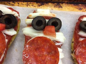 close up of pizza mummies