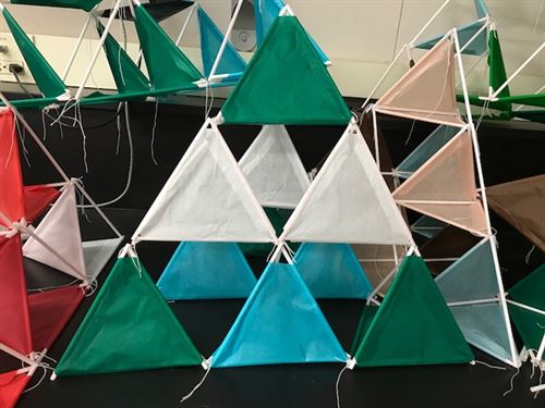 Triangular kite made of green and blue triangles