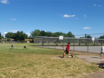 blast students playing softball