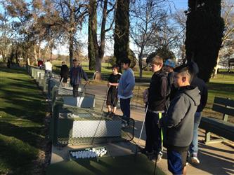 blast students at driving range