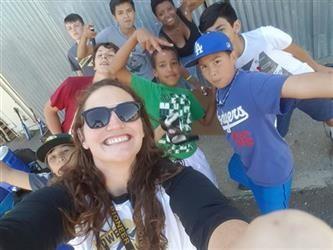 Selfie of students and teacher in sunglasses posing and smiling