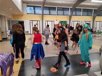 students participating in cake walk at carnival